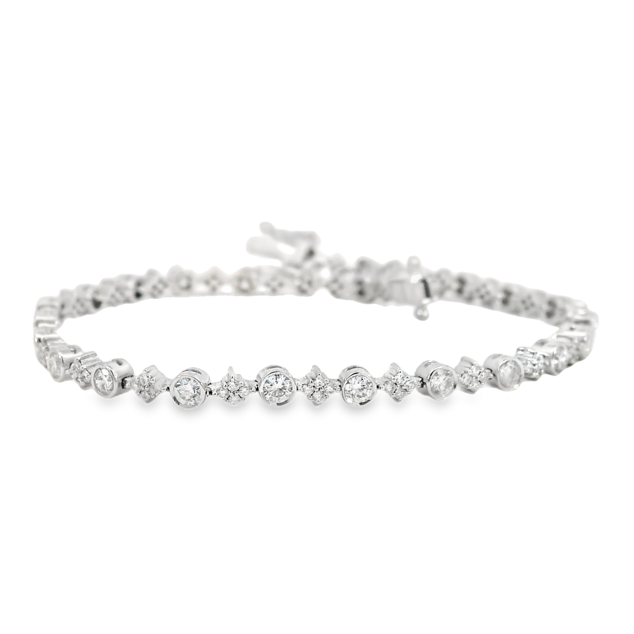 14KW GOLD ROUND DIAMOND BEZEL AND CLUSTER TENNIS BRACELET 1.95CT